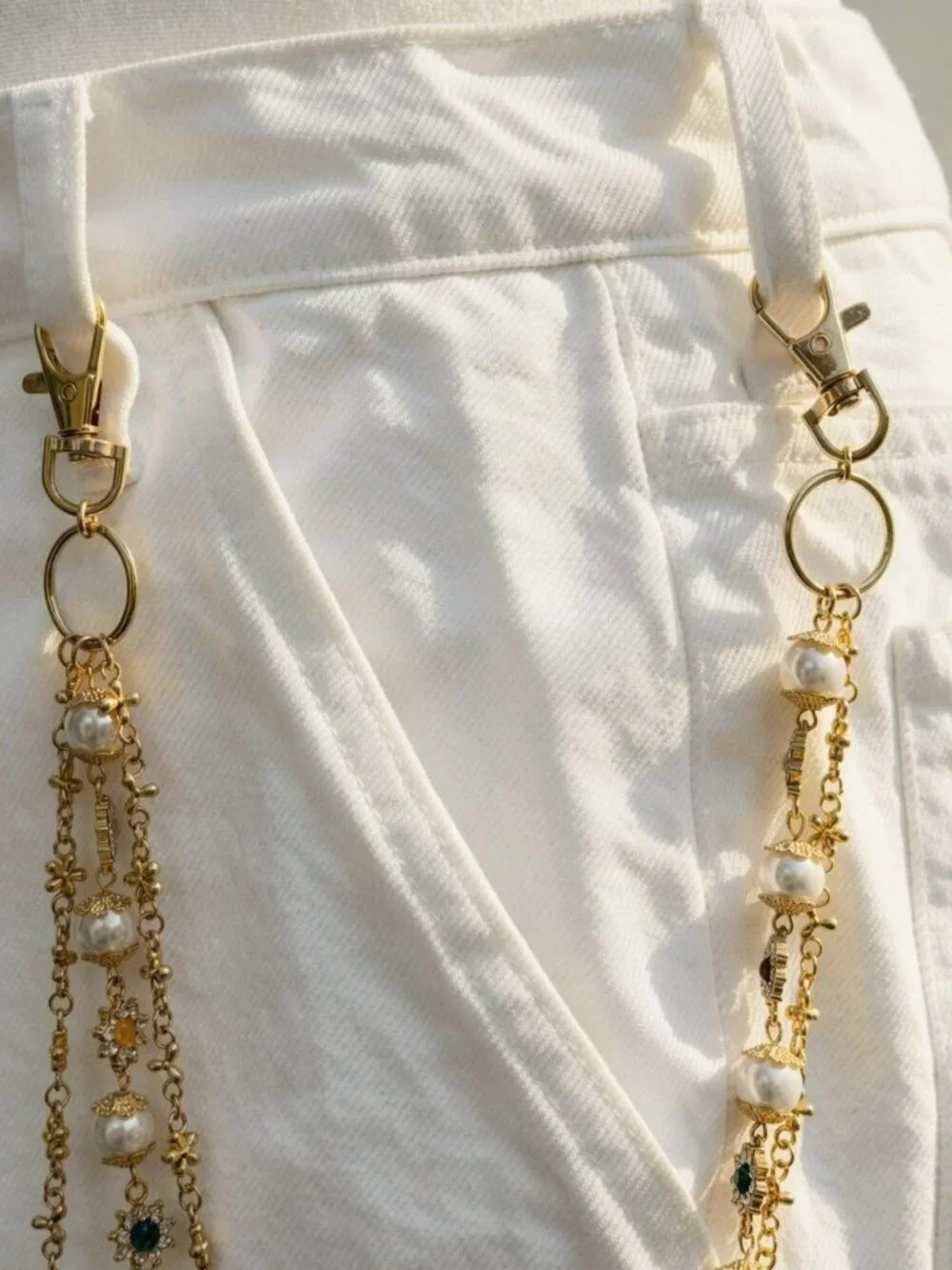 Y2k 2000s style gold chain belt with faux pearls and cross pendant
